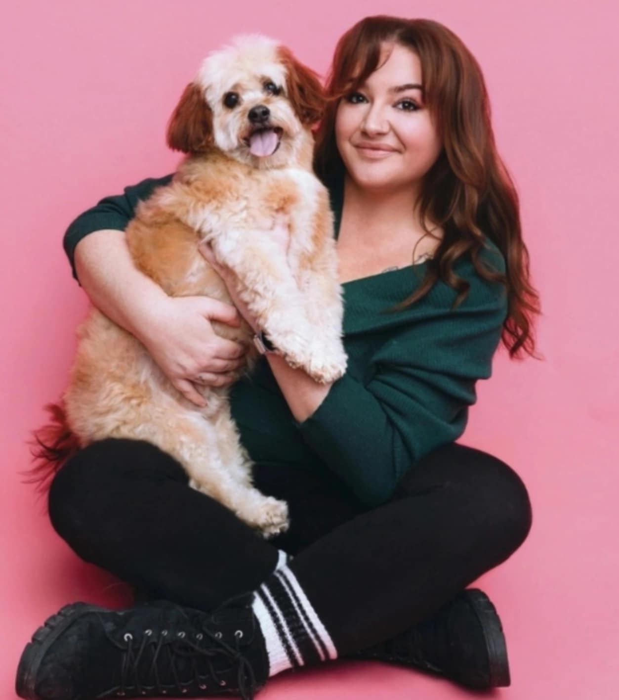 Groomer reviewing client notes